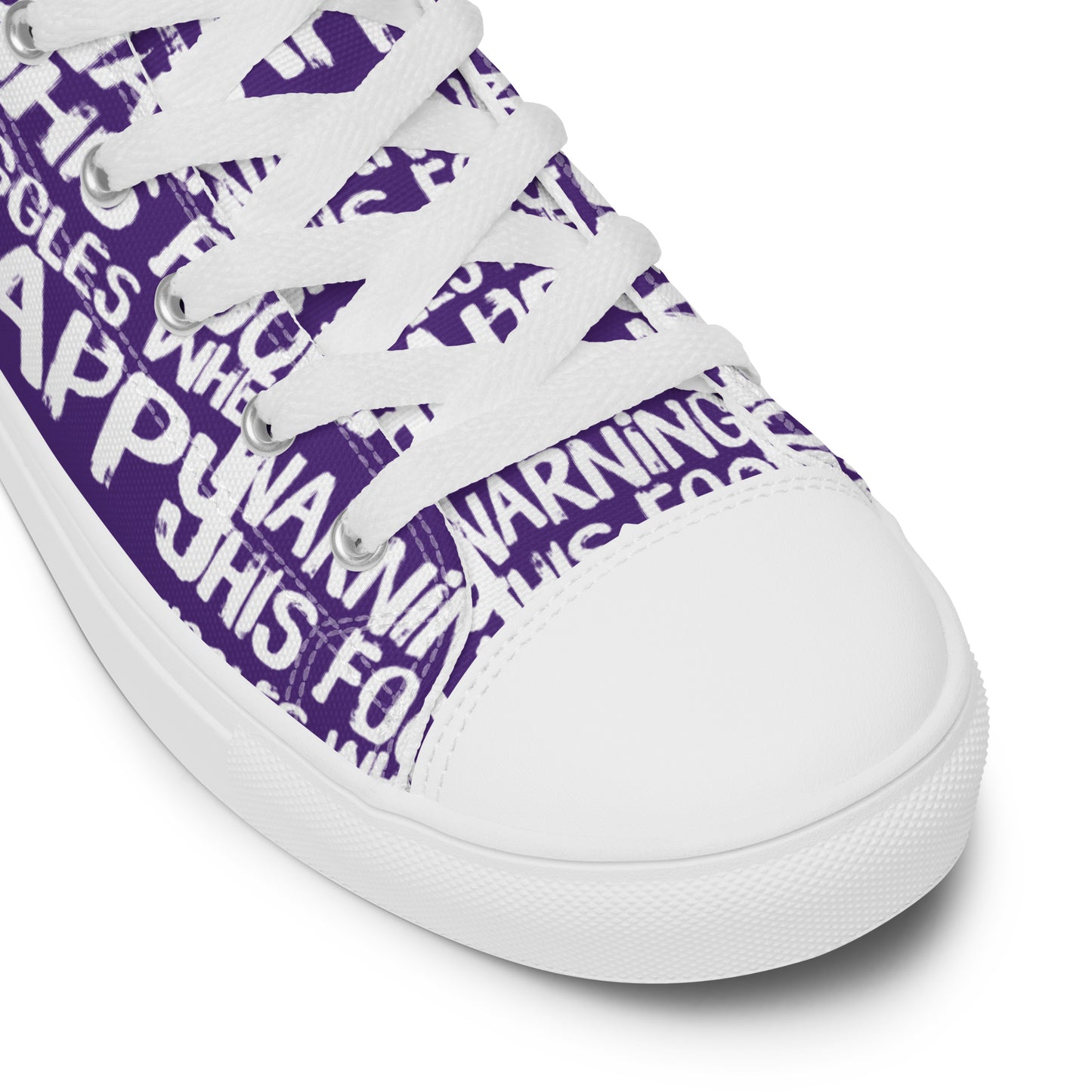 HappyStuff purple high tops with playful white print Warning This Foot Jiggles When Happy white laces faux leather toe cap closeup