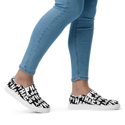 Womans feet walking to the right in Slip on Shoes Happy sponge printed Deck Shoes canvas sneakers black and white shoes HappyStuff brand