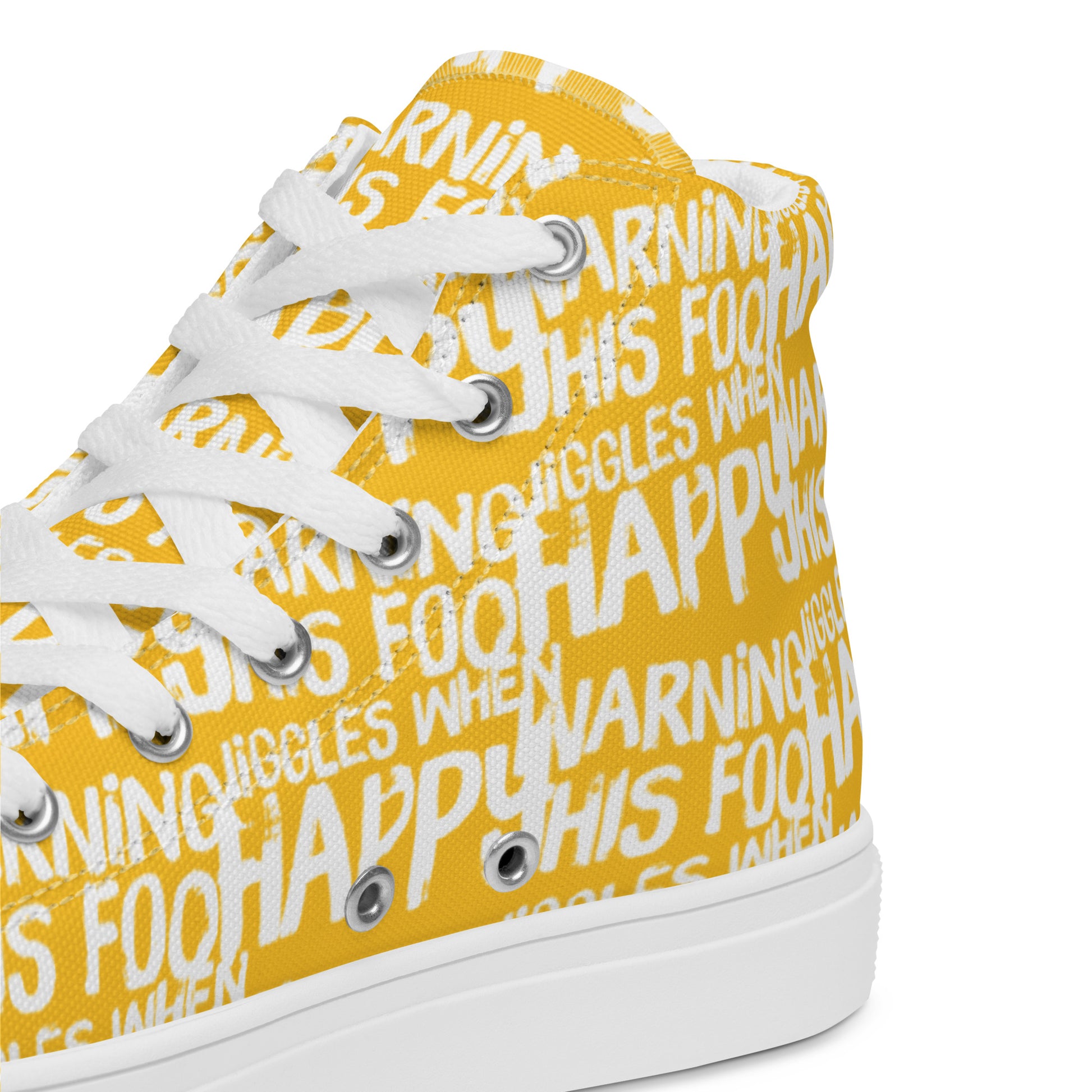 HappyStuff yellow high tops with playful white print Warning This Foot Jiggles When Happy inside heel side closeup view