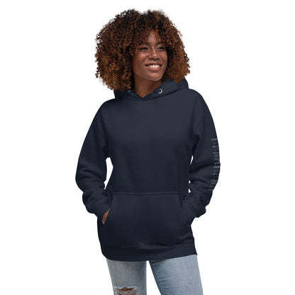 woman wearing navy Cotton Hoodie Grey Happy In Any Language Printed left sleeve modern fit all gender hoodie tailored fit three panel hood pouch pocket