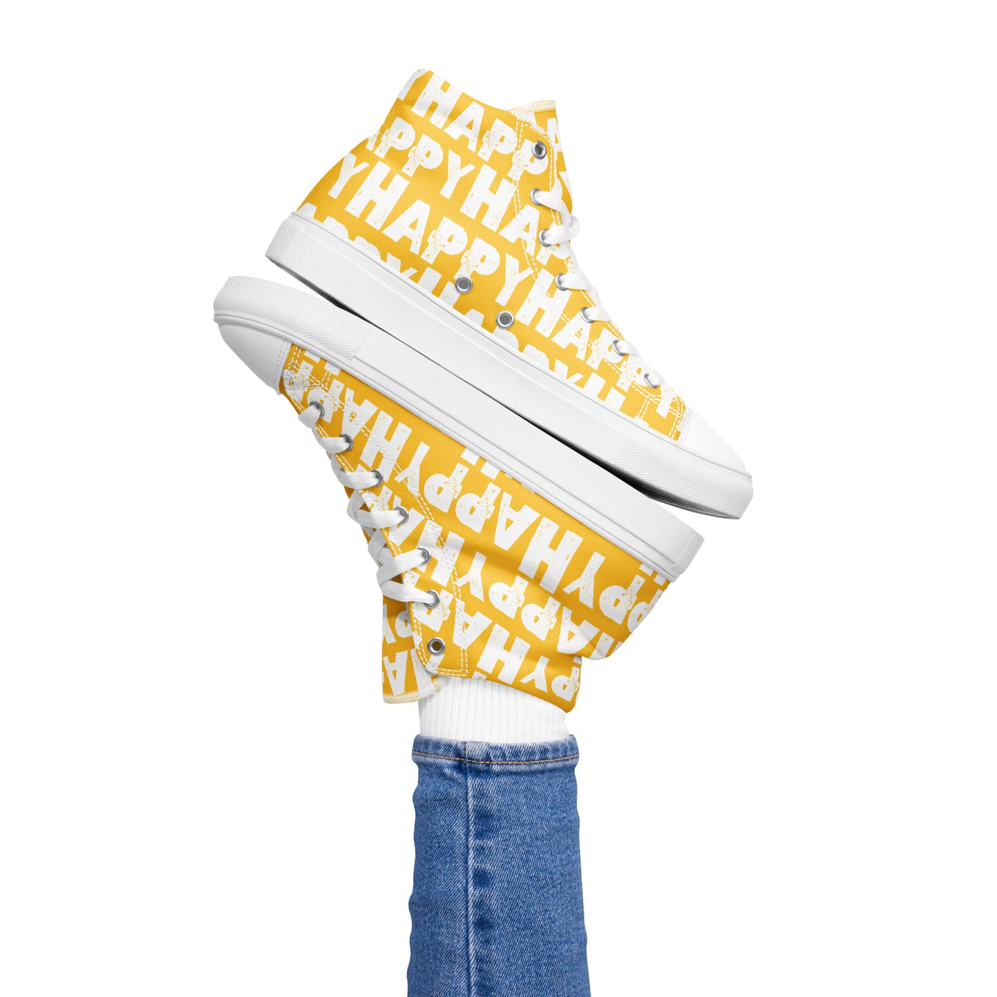 Womans right foot propping up a Happy Sponge Printed High Top Sneaker balancing left HappyStuff fun yellow and white shoes