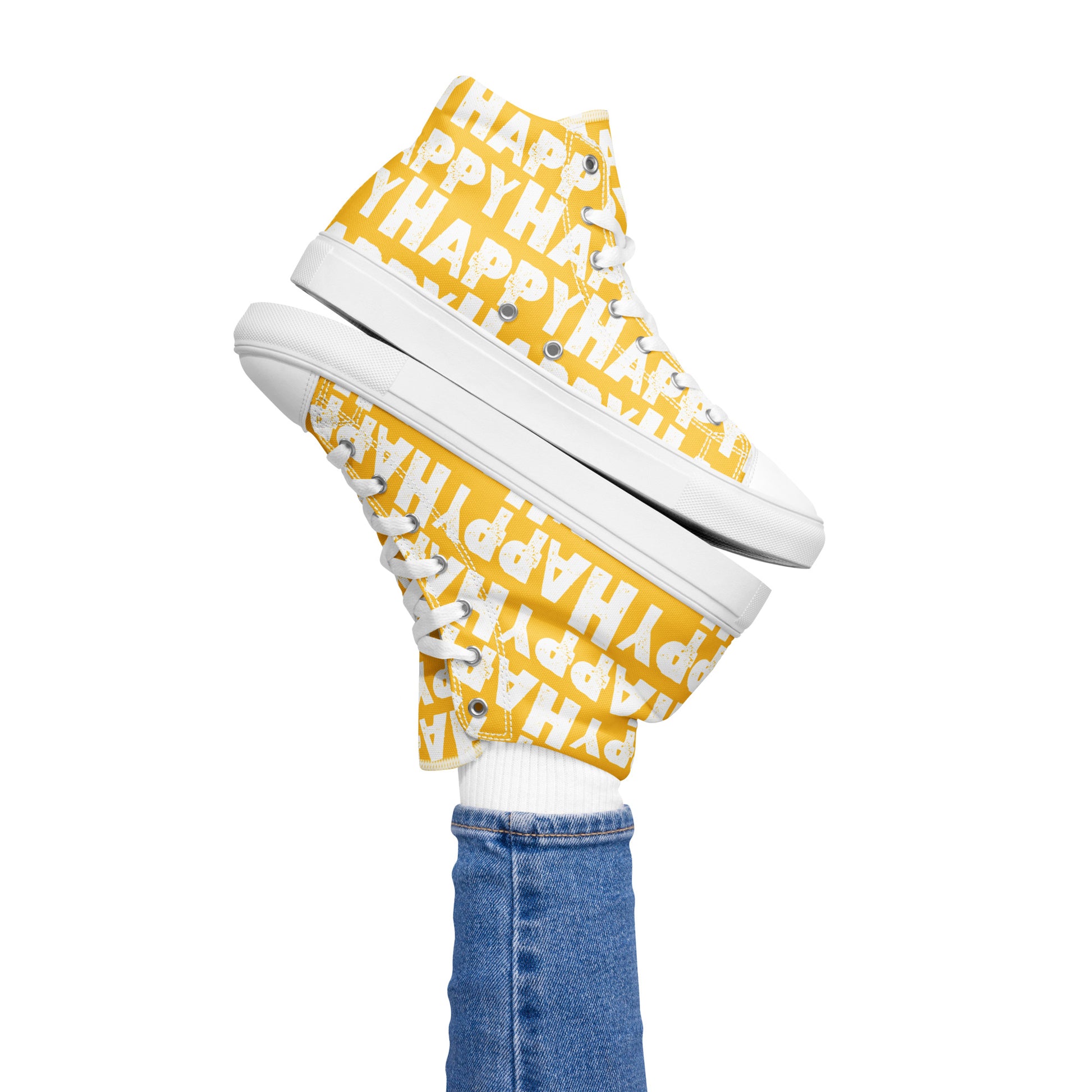 Womans right foot propping up a Happy Sponge Printed High Top Sneaker balancing left HappyStuff fun yellow and white shoes