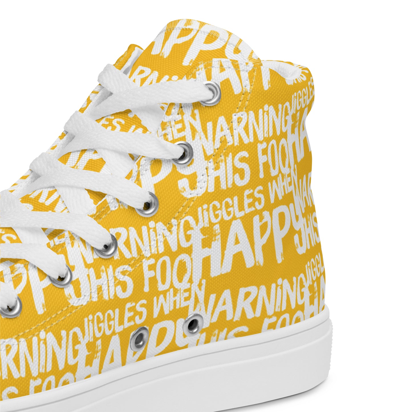 HappyStuff yellow high tops with playful white print Warning This Foot Jiggles When Happy inside heel side closeup view