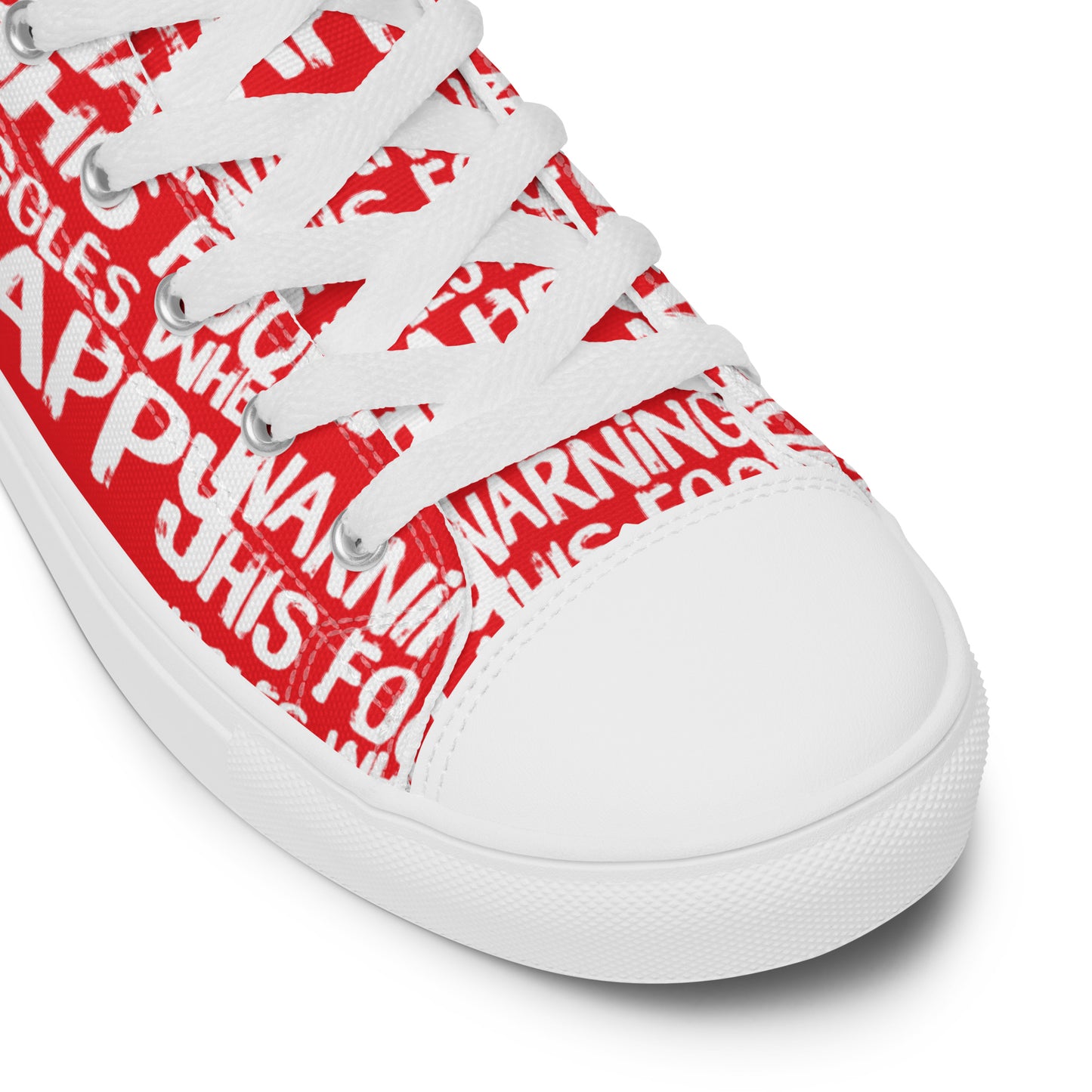 HappyStuff red high tops with playful white print Warning This Foot Jiggles When Happy white laces faux leather toe cap closeup