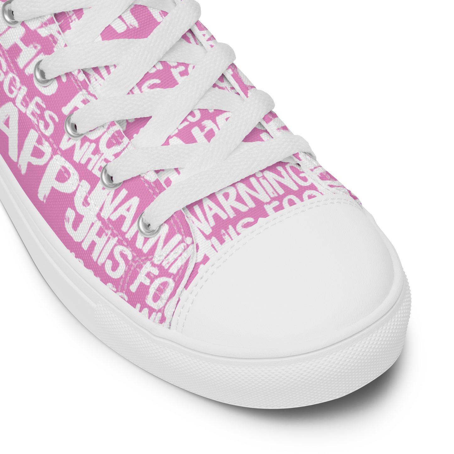 HappyStuff pink high tops with playful white print Warning This Foot Jiggles When Happy white laces faux leather toe cap closeup